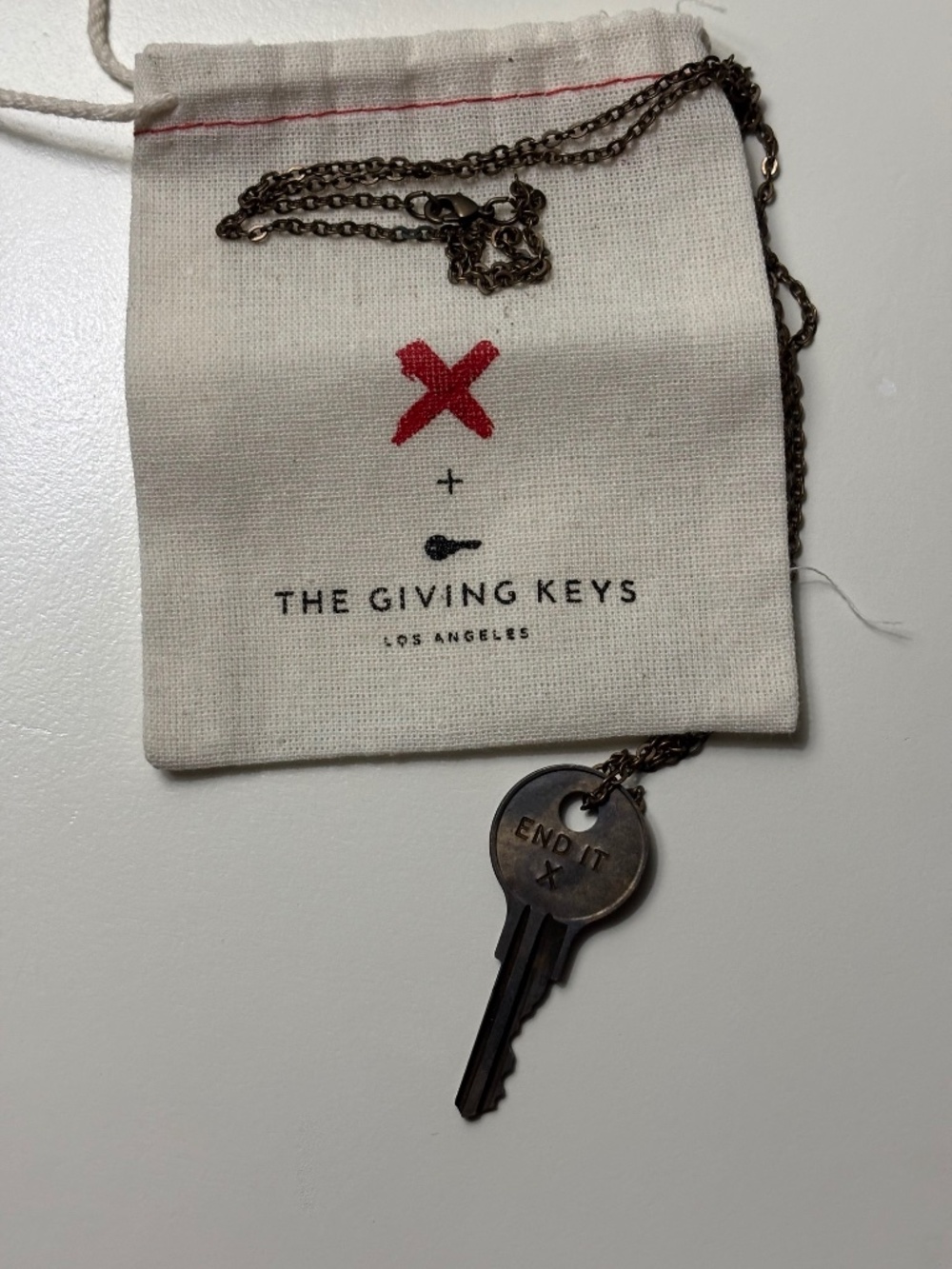 The Giving Keys and X "End It" Bronze Key Necklace